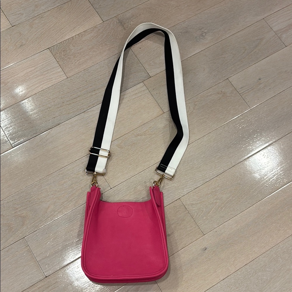 Hot Pink Crossbody Bag with Black & White Strap with gold hardware. Never worn.
